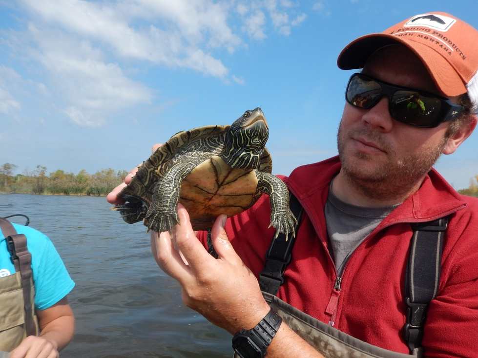 Travis with a map turtle